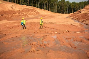 Yellow Dog Executive Director, Mindy Otto, and Special Projects Manager, Emily Whittaker, examining the newly surfaced groundwater on August 6, 2014. Photo courtesy of Jeremiah Eagle Eye. 