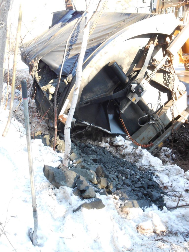Ore spilled on the ground during the accident.