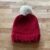 Red winter hat with white pom pom (child)