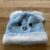 Light blue and white "bunny" winter hat (child)