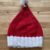 Red "Santa" winter hat with white pom pom and bell (child)